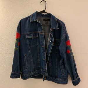 Denim jacket with floral sleeves